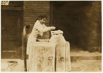 Picking over ash barrels. Boston, Mass., Oct. 1909. L.W.  Location:…, Massachusetts
