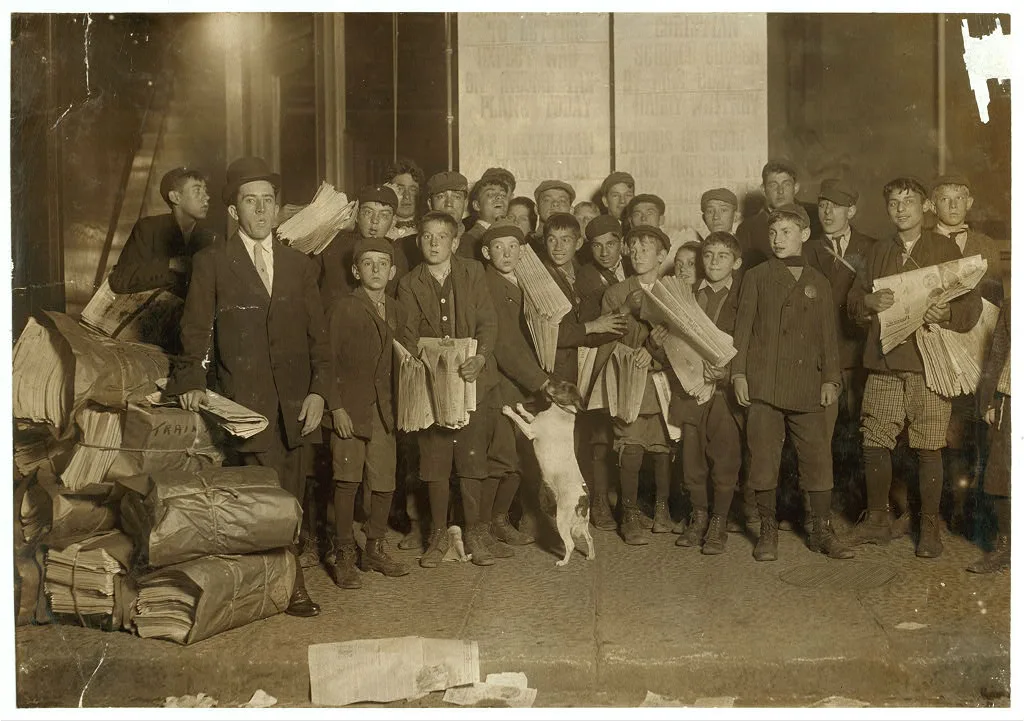 Sunday 5 A.M. Newsies starting out.  Location: Boston, Massachusetts, 1909