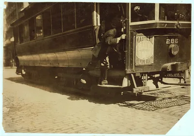 School boy, "flipping cars."  Location: Boston, Massachusetts, 1909