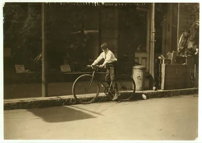 Willie Roberts 11 year old delivery boy in Reiss Department Store. …, Alabama, 1914