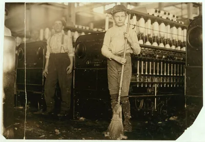 Young sweeper working in Anniston Yarn Mills,.  Location: Anniston,…, Alabama, 1910
