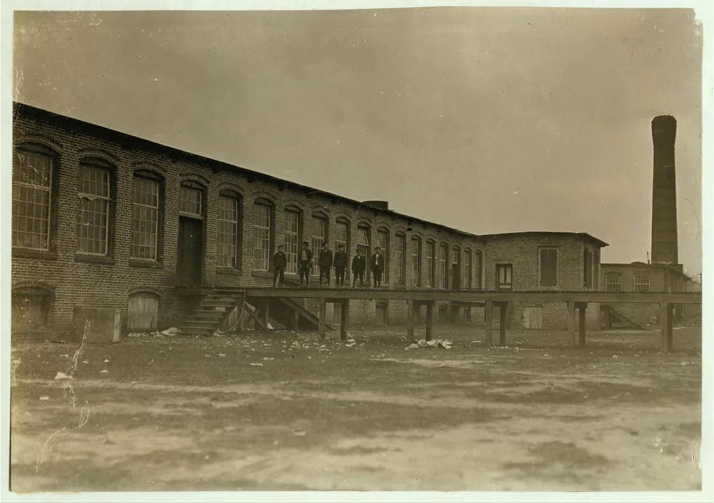 View of Scotland Mills, Laurinburg, N.C. All these boys work in mill.…, North Carolina, 1908