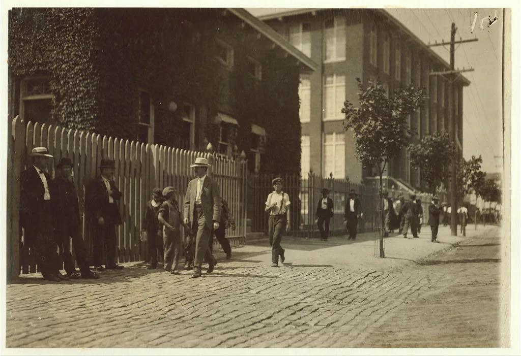 Group of youngsters going in at noon to work in the mill.  Location:…, Massachusetts, 1911