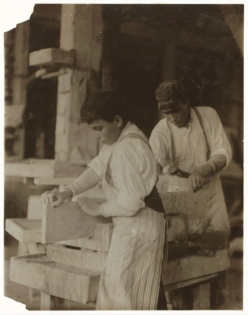 Young boy polishing marble in Vermont Marble Co., Centre Rutland, Vt.…, 1910