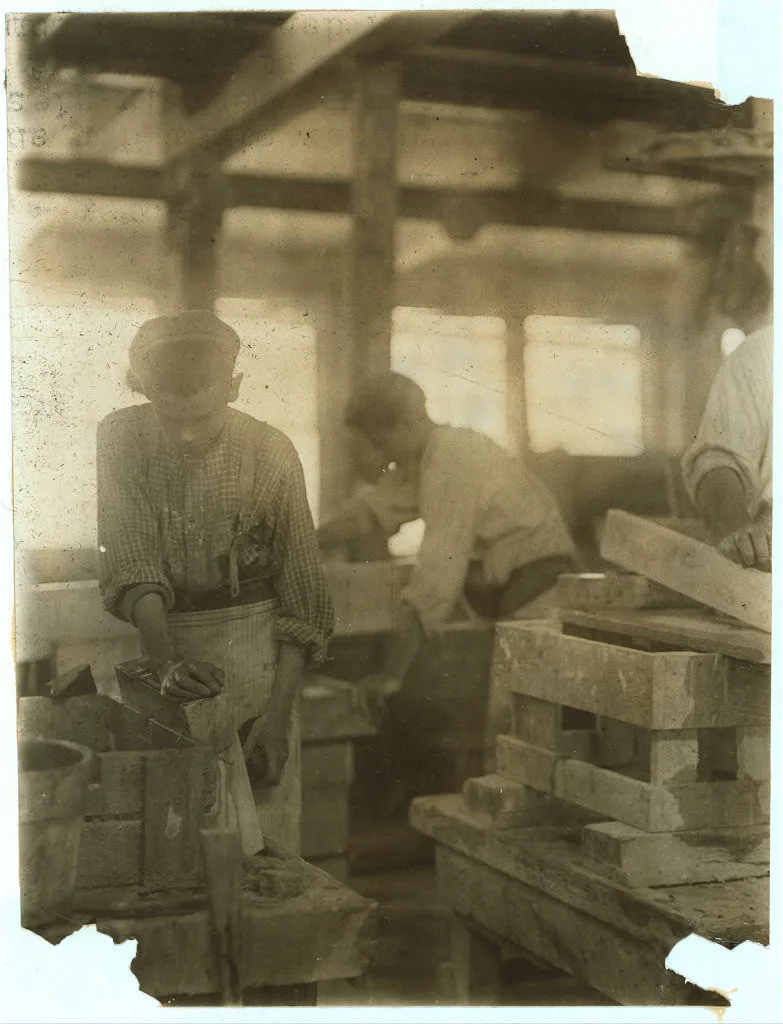 Young boy polishing marble in Vermont Marble Co., Centre Rutland, Vt.…, 1910