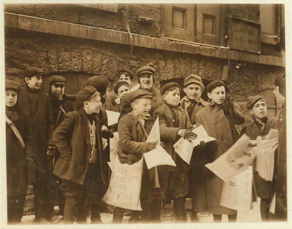 Newsies in the paper alley, getting afternoon editions.  Location:…, New York (State), 1910