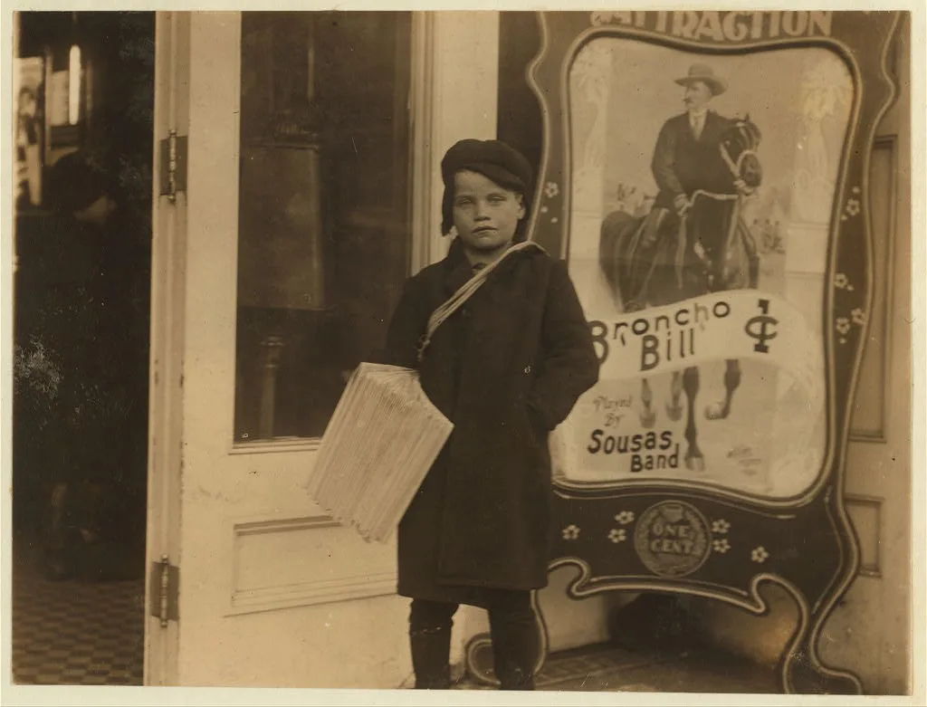 Newsie, ten years old. Going into a moving picture theatre with his…, New York (State), 1910