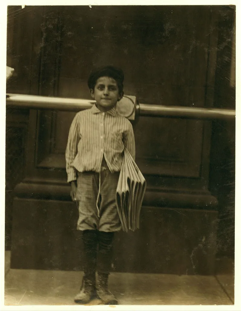 Bennie, an 8 year old newsie selling at Planters Hotel.  Location:…, Missouri, 1910