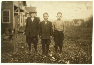 A study of ages. The boy on the right said, "I ain't old enough to…, Massachusetts, 1913