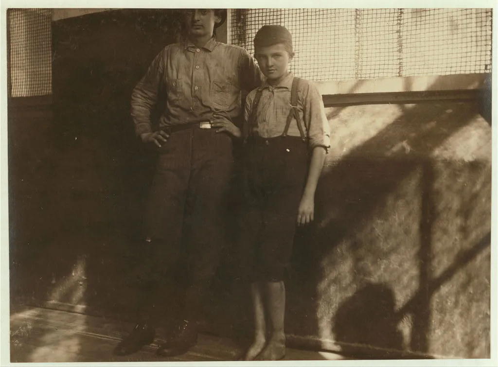 Young doffer going to work in Avondale Mills.  Location: Birmingham,…, Alabama, 1910
