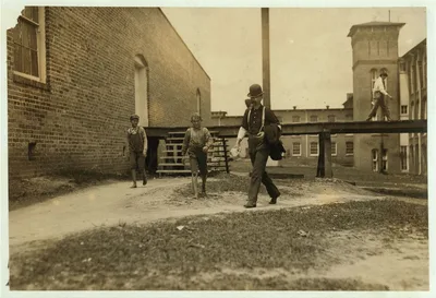Noon hour. Two of the young doffer-boys working in the Laurel Cotton…, Mississippi, 1911