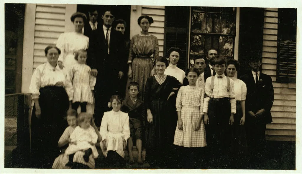 Family of Adrienne Pagnette: The three standing in front row are…, Massachusetts, 1911