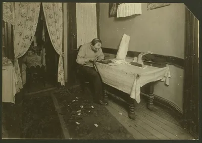 Rolling cigarette cases in tenement home. (For complete details see…, New York (State), 1912