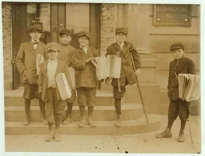 Photograph from New Jersey: 3 P.M. Some of the boys at a busy trolley…