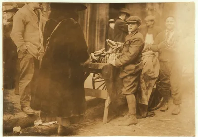 Selling bananas at market.  Location: Boston, Massachusetts, 1917