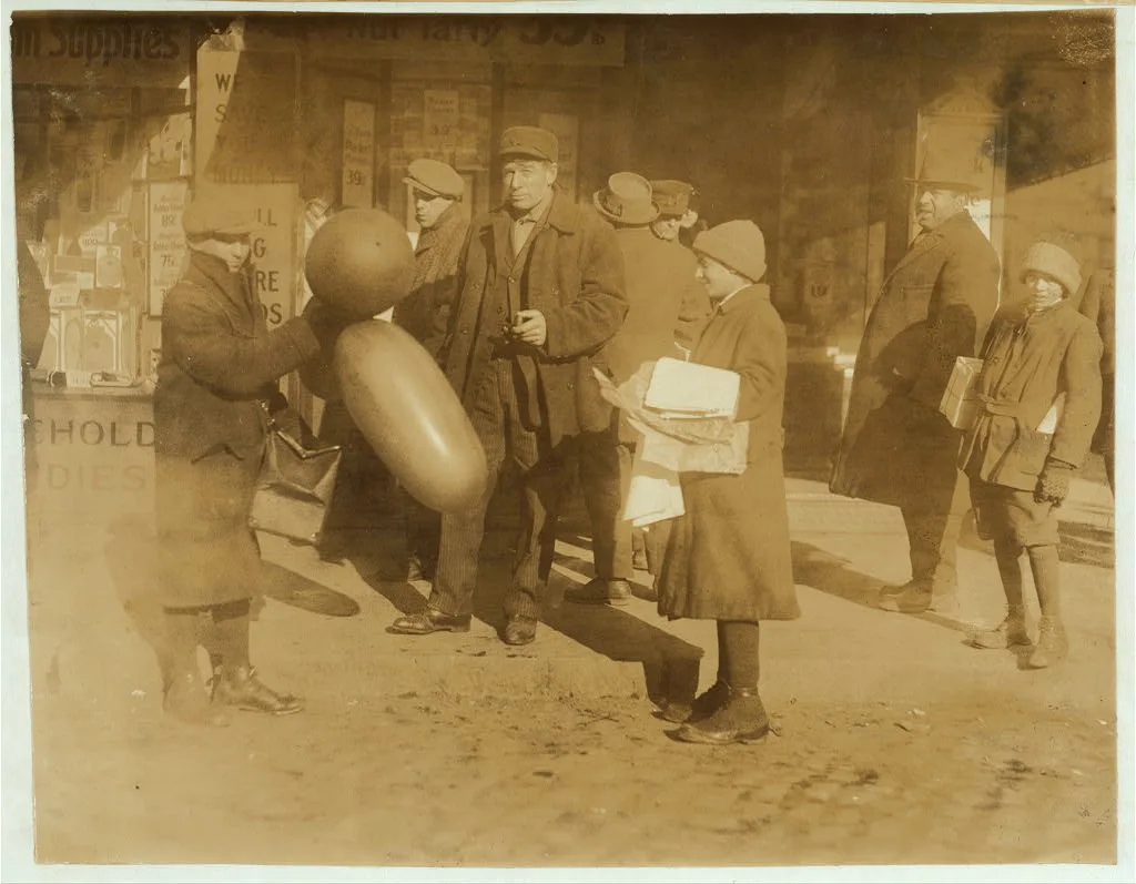 Selling balloons and handkerchiefs at market.  Location: Boston,…, Massachusetts, 1917