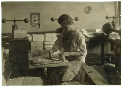 15-year old girl at her old job packing the finished envelopes.…, Massachusetts, 1917