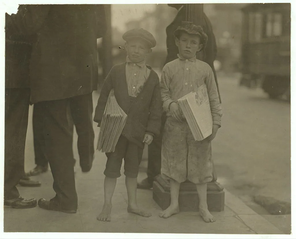 9 year old newsie and his 7 year old brother "Red." Tough specimen of…, California, 1915
