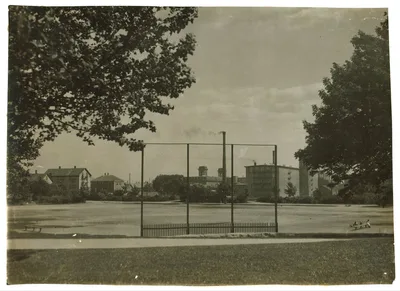 Ruggles Park Playground. Empty 3 P.M. Granite Mills in background. …, Massachusetts, 1916