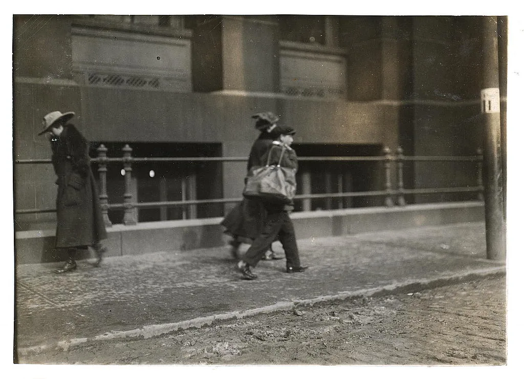 [Street scenes. Delivery boy.]  Location: [Boston, Massachusetts], 1917