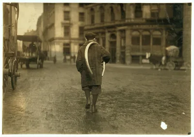[Street scenes. Delivery boy.]  Location: [Boston, Massachusetts], 1917