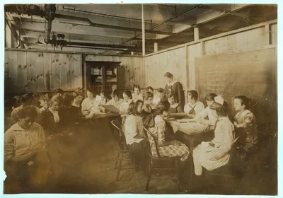 [Continuation School group at Ipswich Mills, South Boston, studying…, Massachusetts, 1917