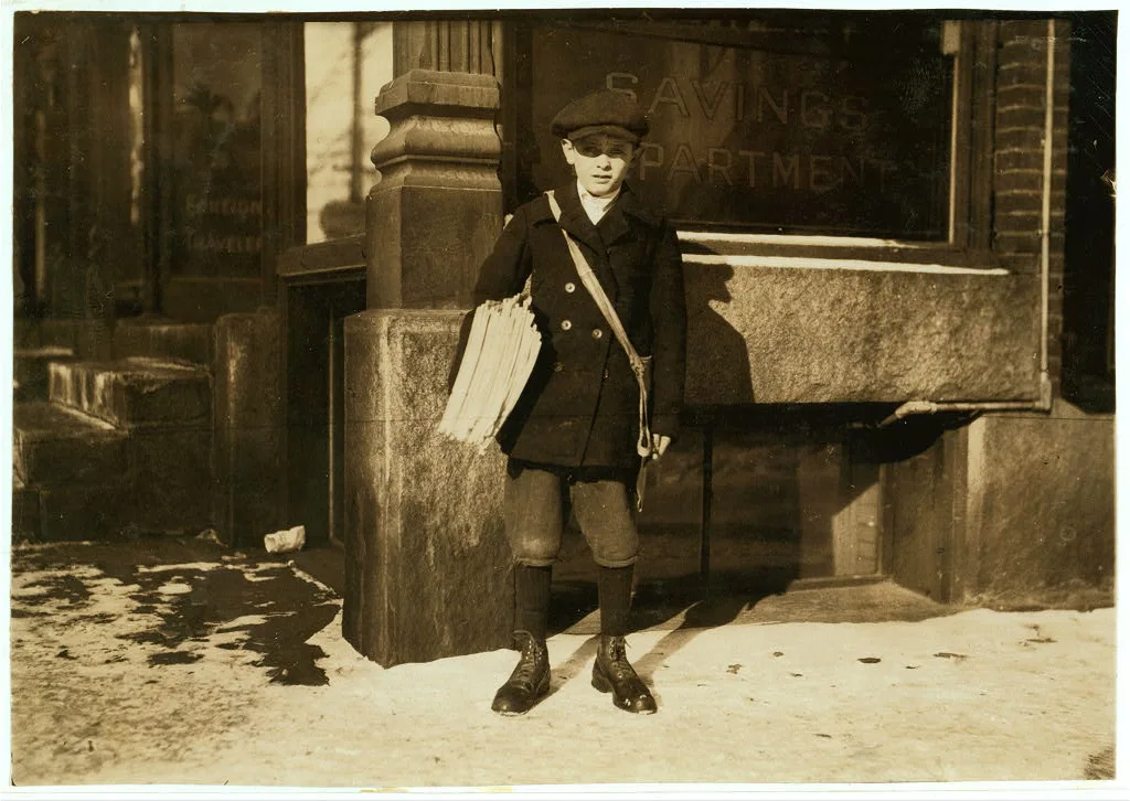 Alfred Hicks, a 10-year-old newsie, selling Boston papers at noon. …, Vermont, 1916