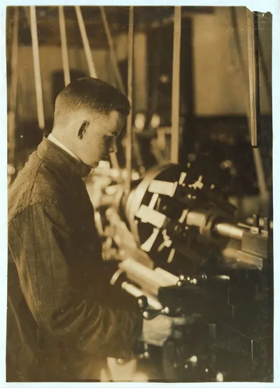 [Vocational class. Boring at a lathe. 15 years old.]  Location: Fall…, Massachusetts, 1916