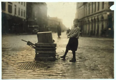 Toting wood - Scavenger.  Location: Fall River, Massachusetts, 1916