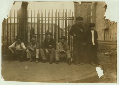 Group around gate of Durfee Mill at noon. 15 year old boy was looking…, Massachusetts, 1916