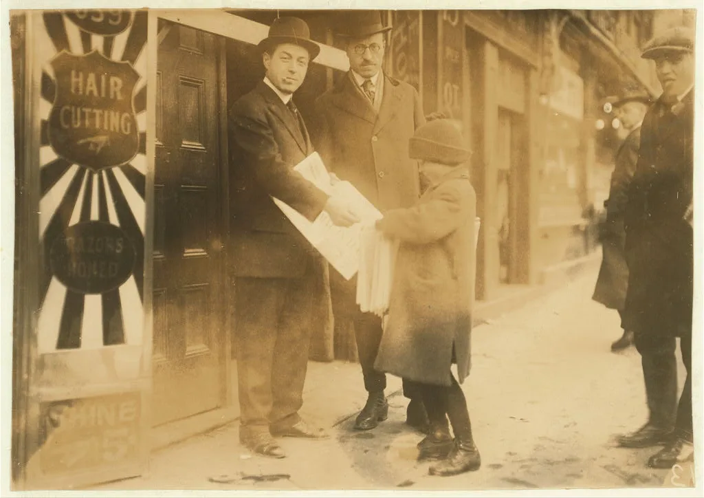 4 p.m. An 11-year old newsie selling near South Station.  Location:…, Massachusetts, 1917