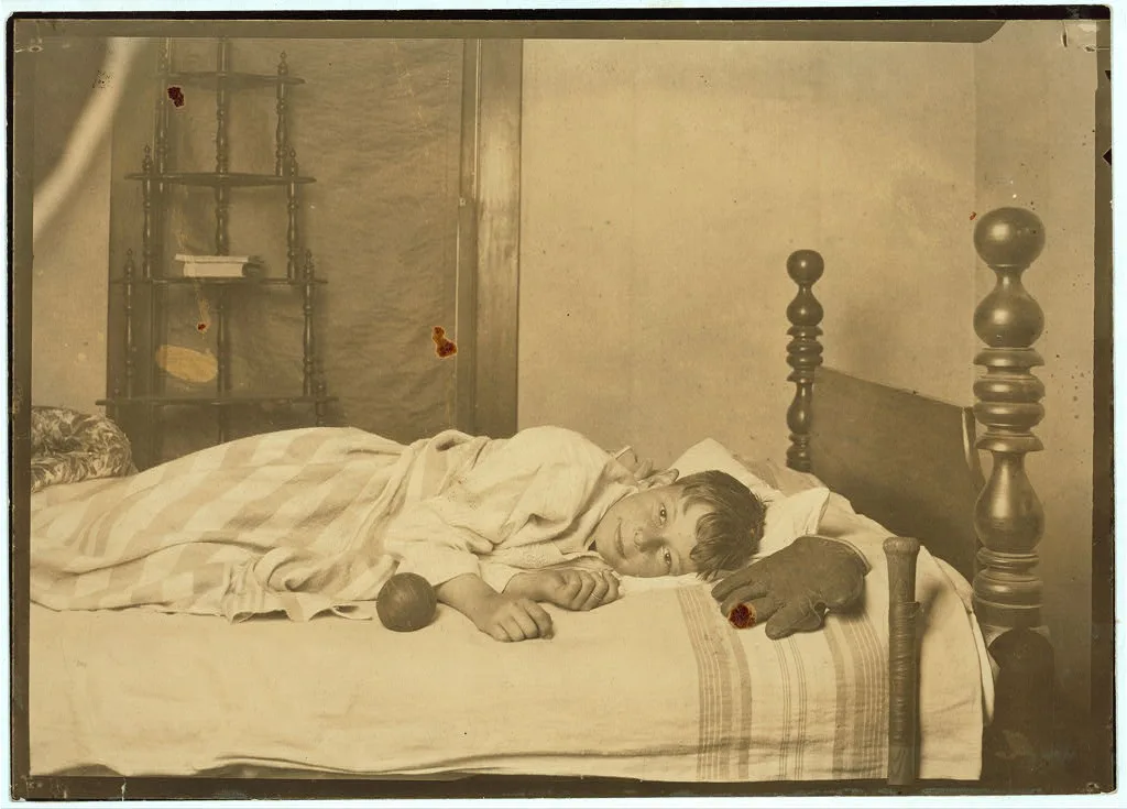 Miscellaneous. Boy in bed--awake, 1924